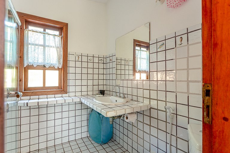 Casa deliciosa 1min da praia Baleia ar condicionad