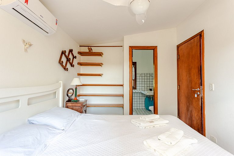 Casa deliciosa 1min da praia Baleia ar condicionad